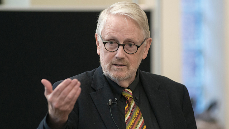 Bo Burlingham &rsquo;68 gestures with his right hand.