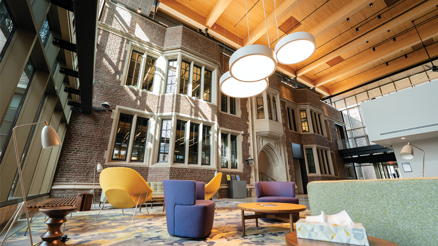 Interior photo of the Frist Health Center showing the new modern interior design resting again the colegiate gothic style of the existing building