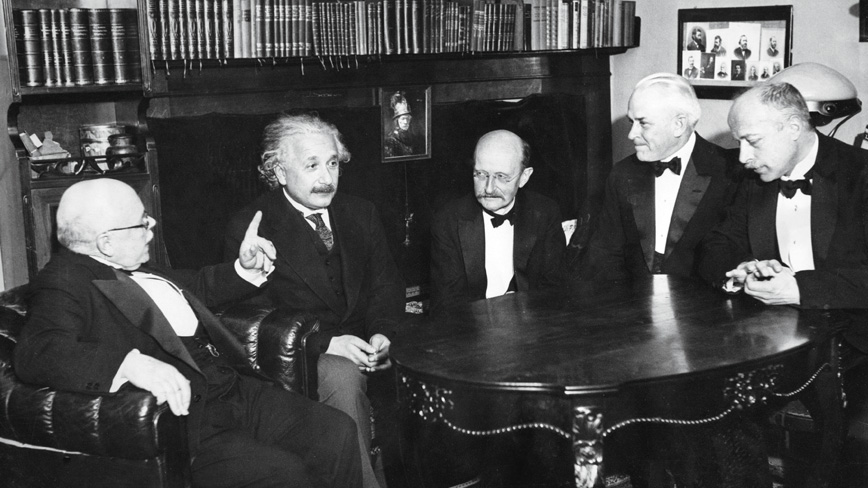Max von Laue, far right, hosts a dinner for German and American physicists, including Albert Einstein, second from left, in November 1931 in Berlin. Several years later, von Laue looked to Einstein to watch over his son, Theo, at Princeton.