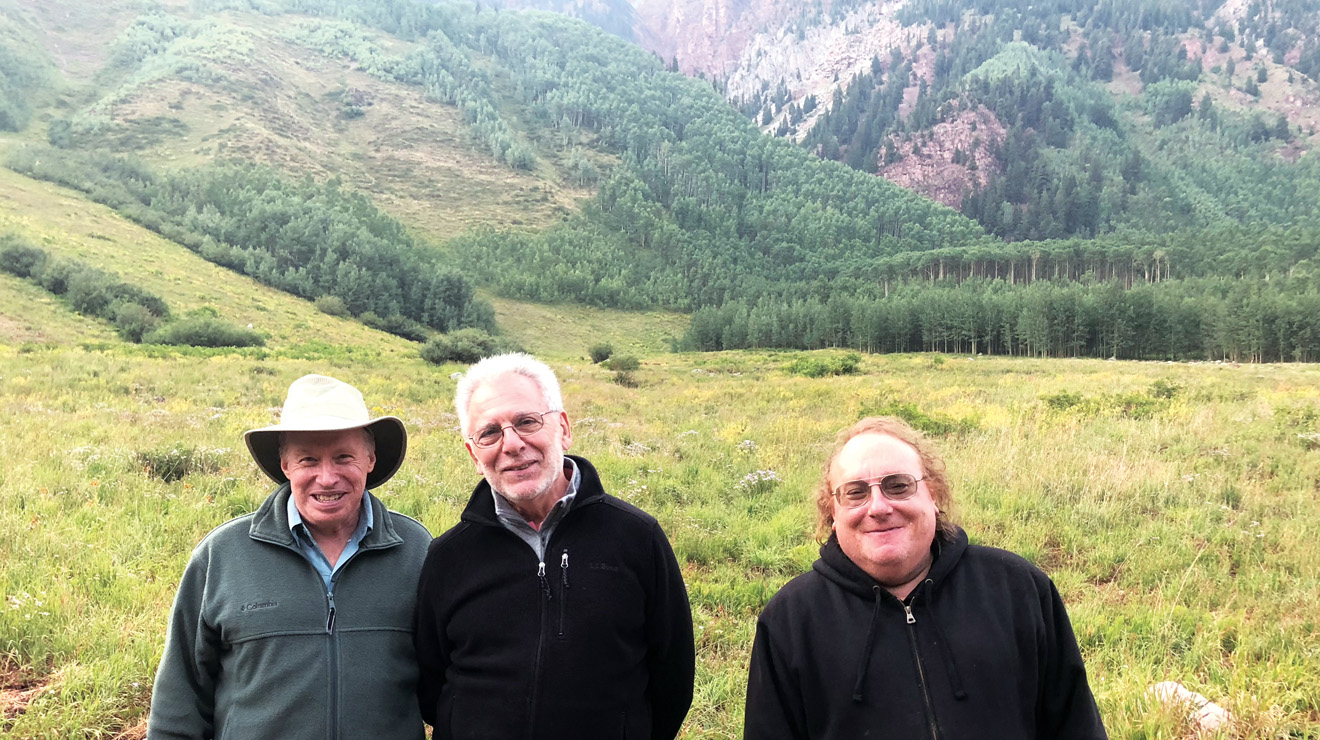 Daniel Arovas ’82, right, a professor of physics at the University of California San Diego, with Dan Freed, professor of math at Harvard, left, and Raymond Mase, chair of the brass department at Juilliard, during a visit to the Aspen Center for Physics.