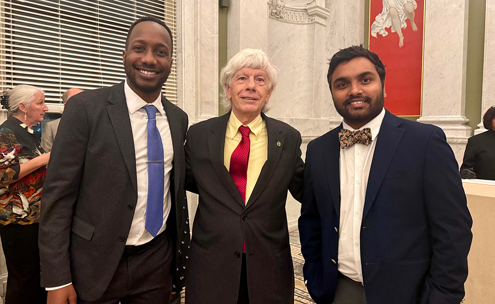 Nare and Lester with Sidney Nagel *75, after he received his Golden Goose Award from American Association for the Advancement of Science.