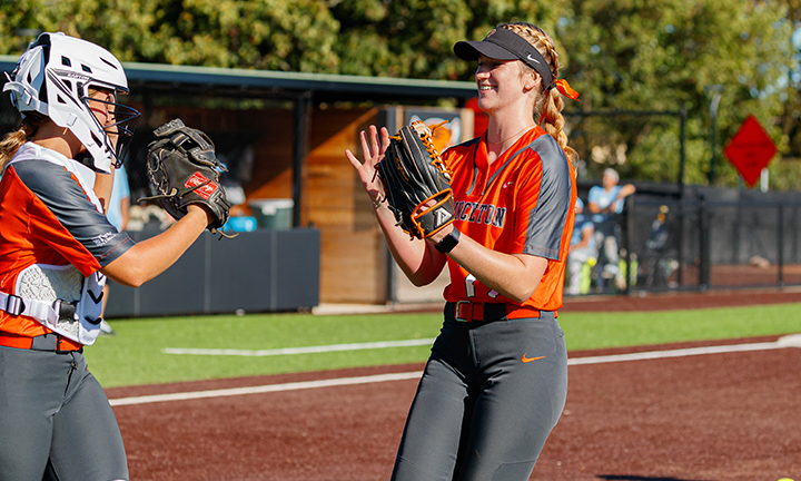 This is a photo of Princeton softball player Alexis Laudenslager ’23 catching a ball.