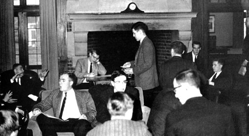 The caption for this 1962 Bric-A-Brac photo reads: Have you ever seen so many guys in ties and coats in your life?