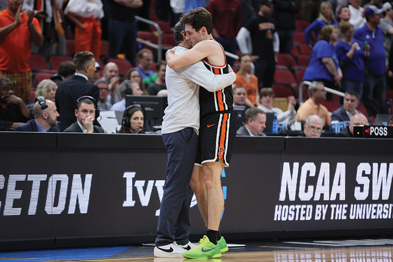Player hugs coach