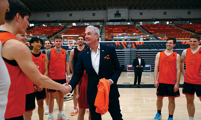 Gov. Phil Murphy shakes hands with New Jersey native Zach Martini 