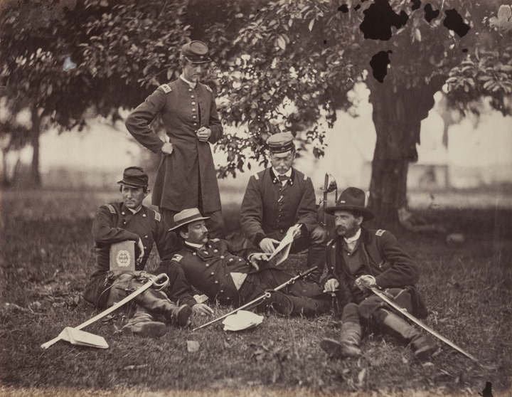 “Studying the Art of War, Fairfax Court-House, June 1863” — The five men shown here, including a Prussian and a Swede, underscore the international flavor of the war. Gardner singled out for special praise Col. Ulric Dahlgren (standing), “handsom