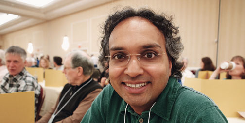 Sixth-place &shy;finisher Kiran Kedlaya *97 at the puzzle table