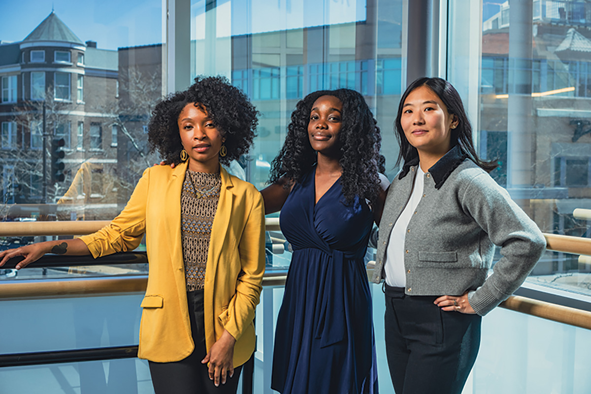 Haynes is flanked by her DIW colleagues, creative director Ashant&eacute; Green, left, and development coordinator Emma Wang &rsquo;23.