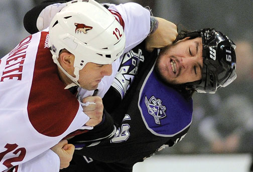 The Los Angeles Kings’ Kevin Westgarth ’07, right, mixes it up in a February game against the Phoenix Coyotes.