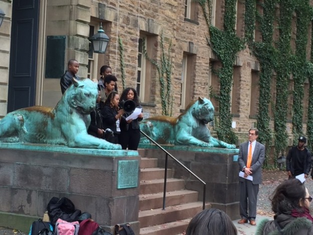 President Eisgruber â83, right, listens to the demands of the Black Justice League. (PAW/W. Raymond Ollwerther â71)