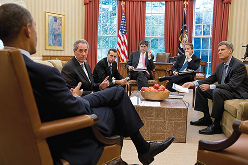 Krueger, right, and other advisers meet with President Barack Obama in the Oval Office in August 2012. Michael Froman &rsquo;85, then an economics adviser and now U.S. trade representative, is pictured at left.