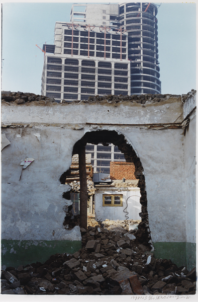 Zhang Dali, Chinese, born 1963: Demolition–World Financial Center, Beijing, 1998. Chromogenic print, 89.5 x 59.7 cm. Collection of David Solo. © 1998, Zhang Dali / photo: Bruce M. White.