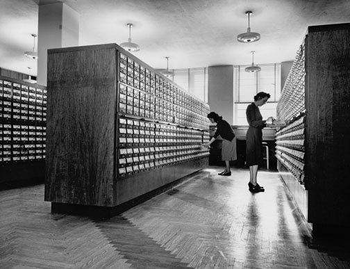 Drawer fronts from the card catalog will become part of an exhibit in the library lobby. The card will be recycled.