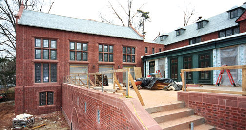 This early March photo of construction at Ivy Club shows a new three-story wing that houses a great hall with a vaulted ceiling. At right, the “winter room” overlooks the terrace.