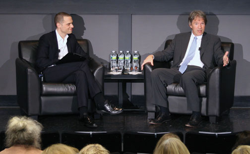  David E. Kelley ’79, right, makes a point Nov. 17 as Jordan Roth ’97 listens.