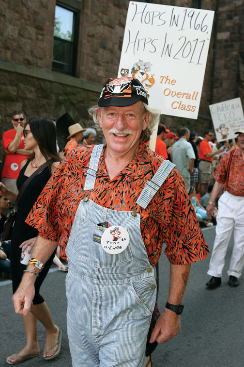 LIVE.R-BKS66_371.jpg Tony McEwan ’66 lives up to his membership in the “overall class” as he struts down the P-rade route.