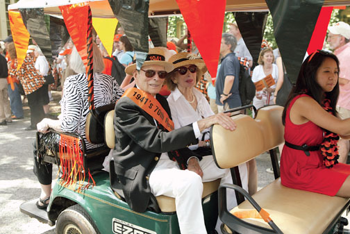 LIVE.R-FW41_3641.jpg Lou Prince and his wife, Betty, ride along the route at 1941’s 70th.