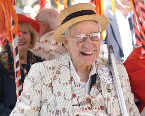 Nathaniel &ldquo;Buz&rdquo; Bedford &rsquo;39 beams as he rides in the P-rade.