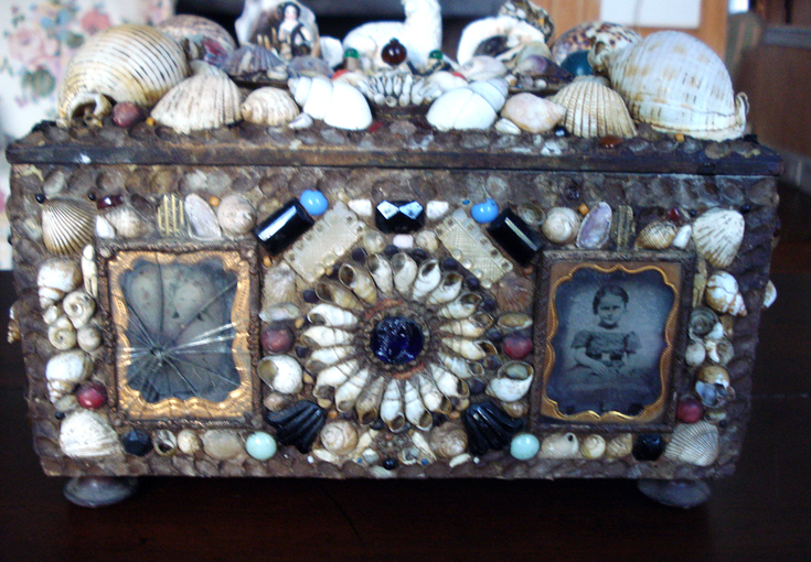 This late 19th century “tramp art” or “Shell Art” memento box is from a seller in Missouri. 