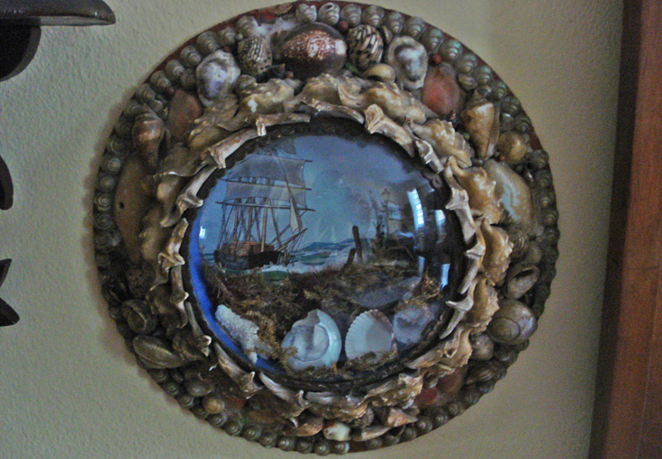 This Victorian shell souvenir with a painted scene under bubble glass is from an Arizona eBay seller.