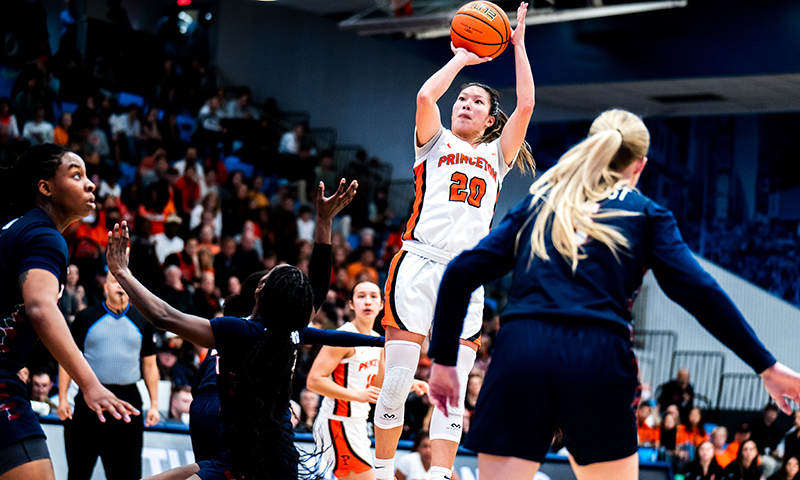 Princeton's Kaitlyn Chen shoots over Penn defenders