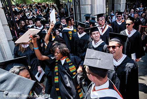The Class of ’14 exits jubilantly through FitzRandolph Gate at the conclusion of Commencement.