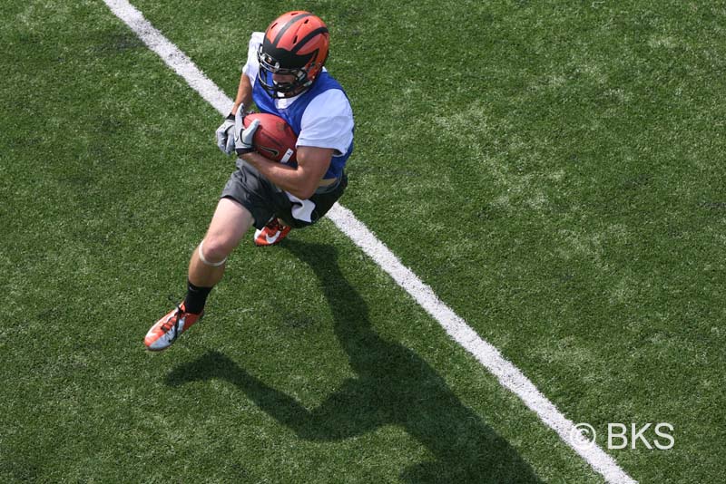 Players wore jerseys, shorts, and helmets in the opening session. Ivy League rules limit teams to two full-contact practices per week.