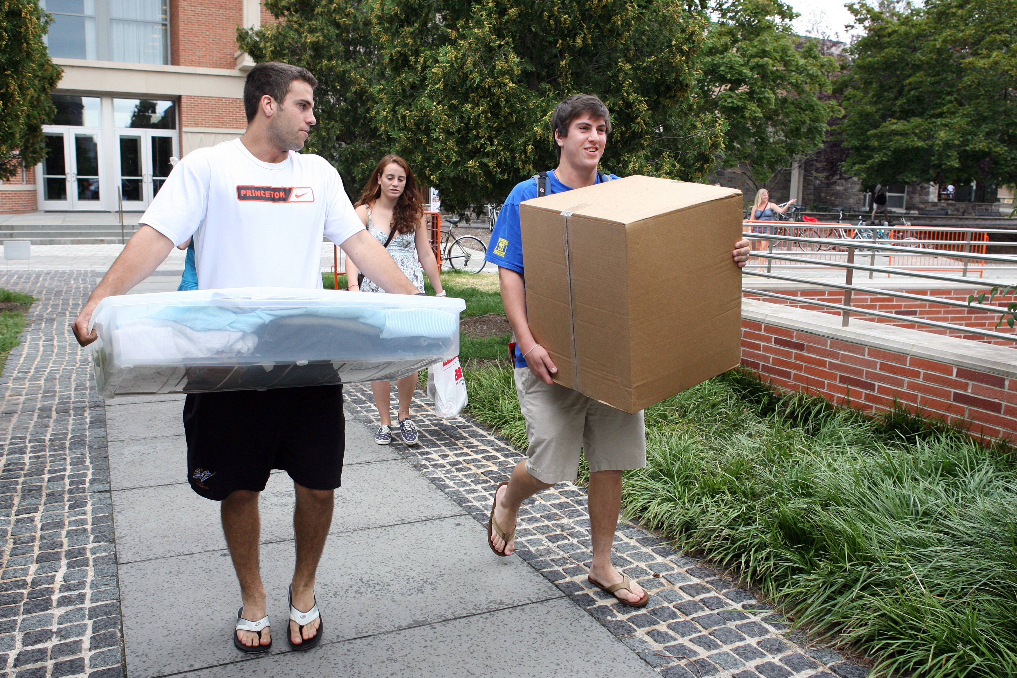 Freshman Brendan DeTommaso, right, gets a helping hand from Michael Grossman '12.