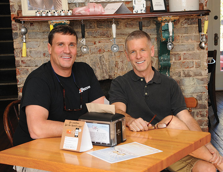 Tim Koons-McGee ’80, left, and his husband, Roy, resolved to embark on a career together: running an ice cream shop.