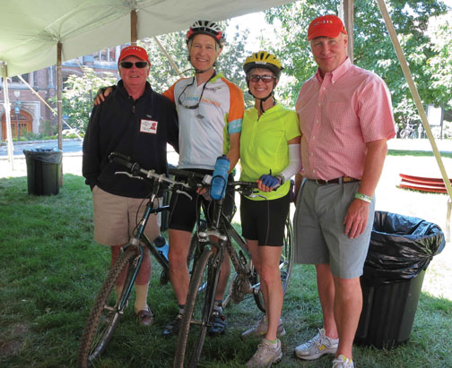 From left, &rsquo;72 reuners Fritz Cammerzell, Tom Jones, Diana Foster-Jones, and Jim Robinson help to collect bicycles for children in Trenton.