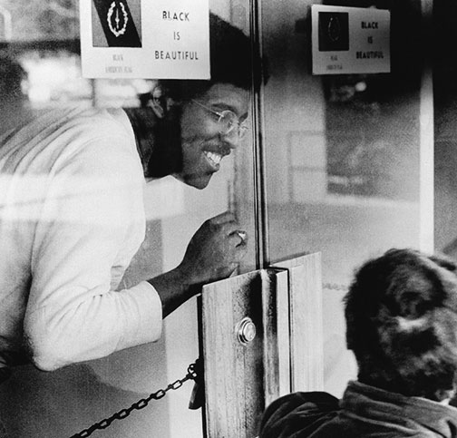 Brent Henry ’69, a leader of the Association of Black Collegians and today a Princeton trustee, behind the chained door of the New South administration building.