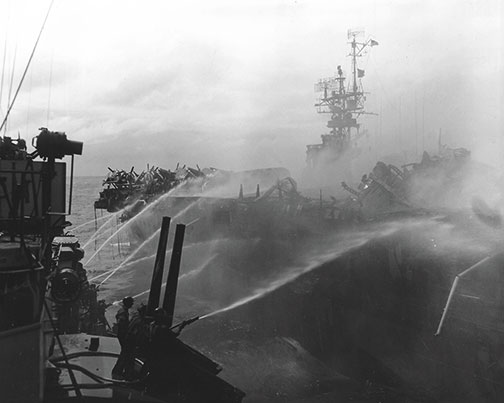 TWTnew_5.jpg Alan Reed ’40 died after boarding the USS Princeton, in flames, Oct. 24, 1944. He was assigned to the USS Birmingham, shown here fighting the fire.