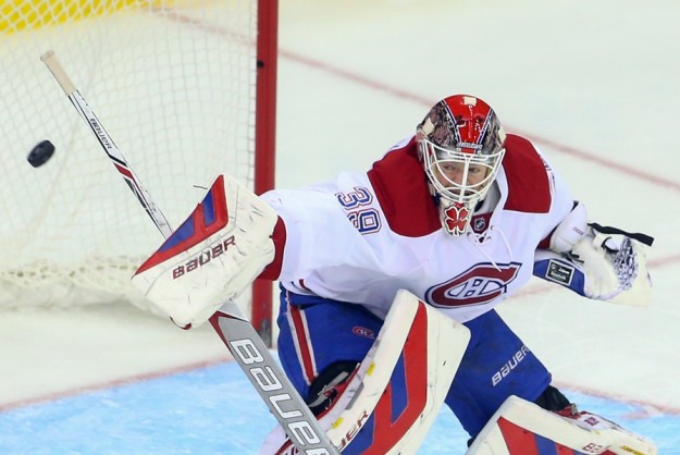 Mike Condon â13 makes a save during a Nov. 27 Montreal win against the New Jersey Devils. (Ed Mulholland, USA TODAY Sports)