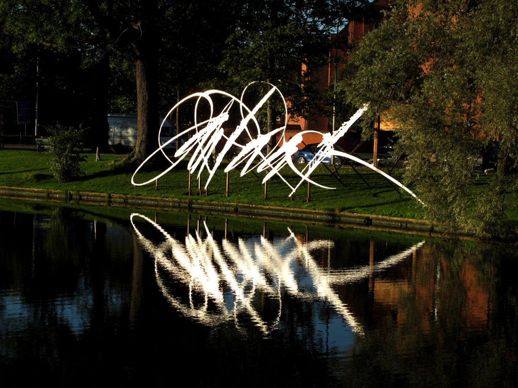 Metaalgrenzen (Metal Borders) — one of three monumental metal sculptures placed around the city of Bruges as part of an arts festival. This sculpture is the name of Jan Palach, a young Czech student who died by self-immolation during the Prague Spring. 