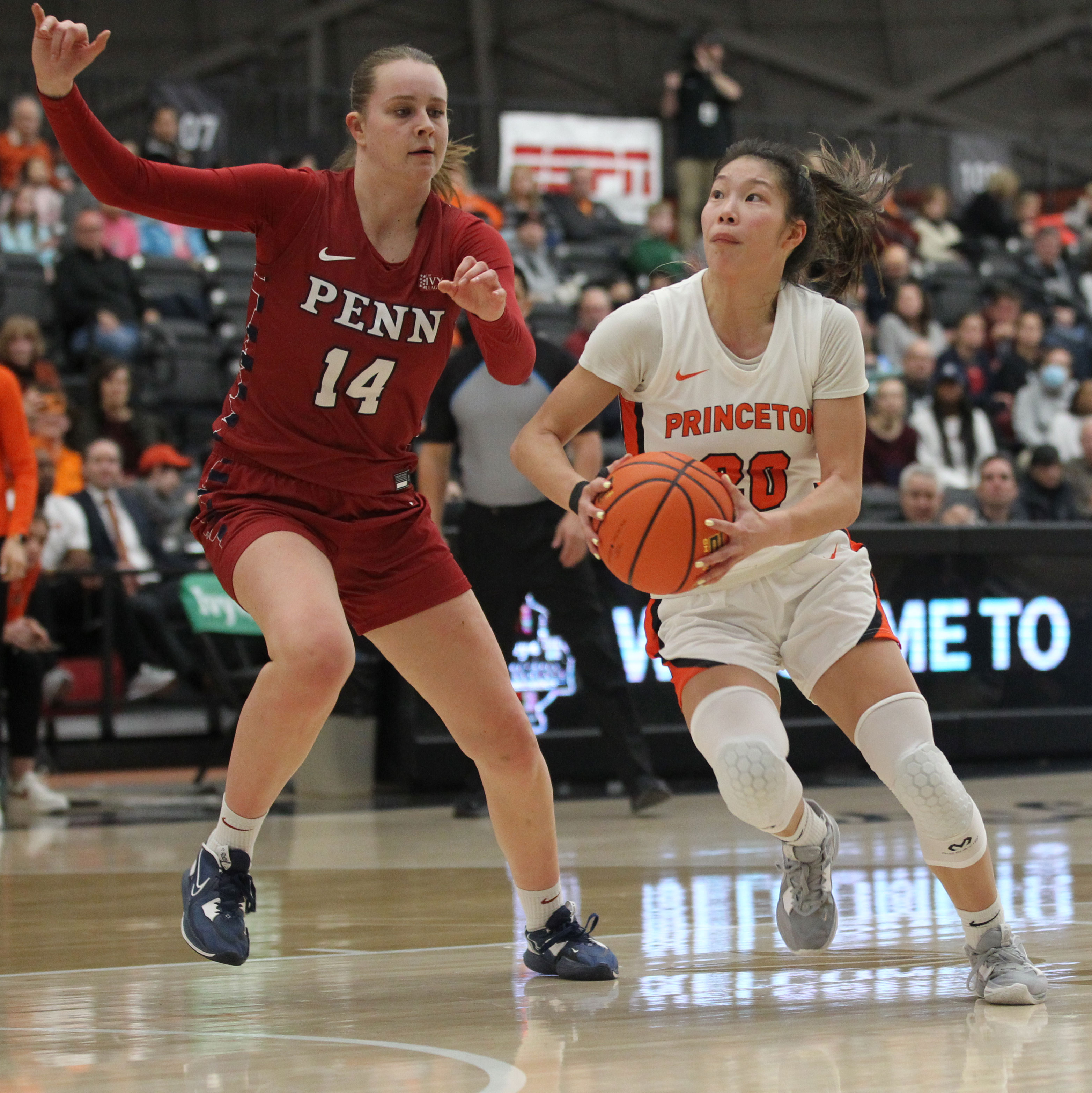 Princeton player on right prepares to shoot against defender on left
