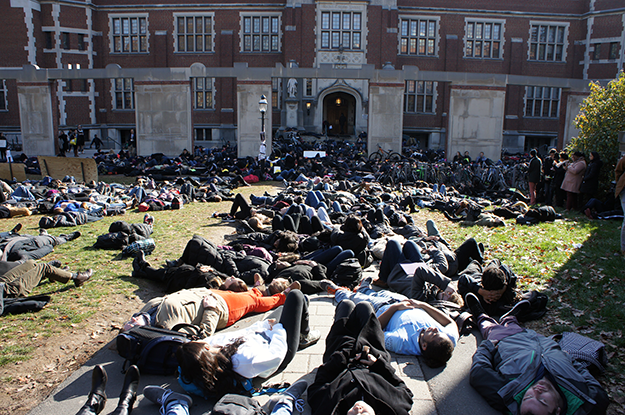 Protesters blocked the paths outside Frist in a symbolic “die-in.” 