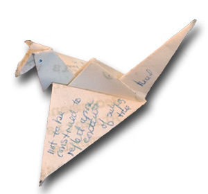 mccosh_2_web.png Librarian Gabriel Swift, top, carefully removed this origami crane from Firestone’s bust of James McCosh. It is one of the items on display in a new exhibition.