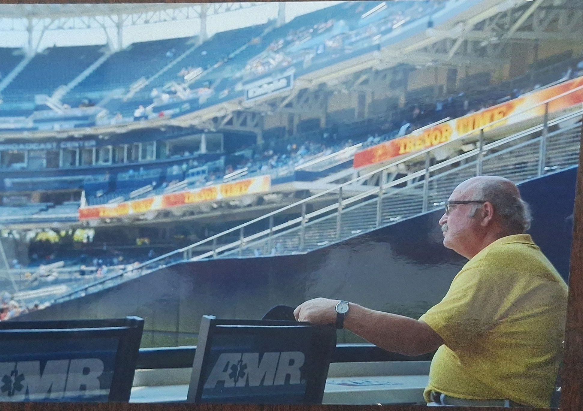 Toy Savage sitting in an empty stadium