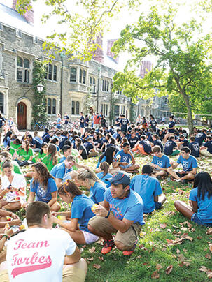 OTC-OE5952new.jpg Following Opening Exercises and the Pre-rade, freshmen gathered for a barbecue on Alexander Beach.