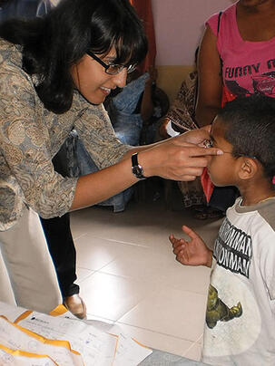 Prince-AshanthiNew.jpg A nonprofit founded by Ashanthi Pereira Mathai ’95, left, has provided prescription eyeglasses to 35,000 children and adults.