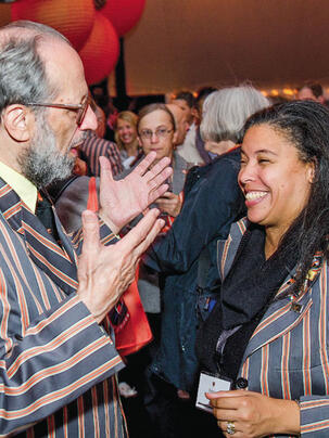 pres_3.jpg Eli Arthur Schwartz *60 and Patrice Jean *99, adorned in their Association of Princeton Graduate Alumni Reunions jackets, enjoy a conversation during the “Many Minds, Many Stripes” conference.