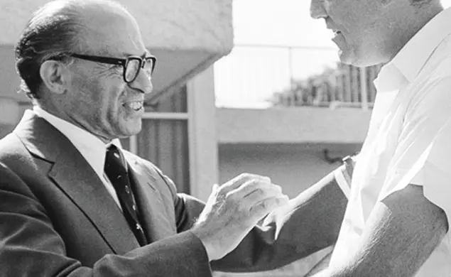 Samuel W. Lewis *64, right, with soon-to-be Israeli prime minister Menachem Begin.