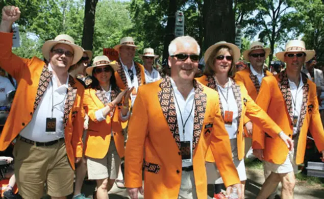 About 24,000 people attended Reunions, and most marched in the P-rade. Here, wearing their new jackets, an enthusiastic contingent of more than 1,500 marchers from the Class of 1988 led the classes in the P-rade.