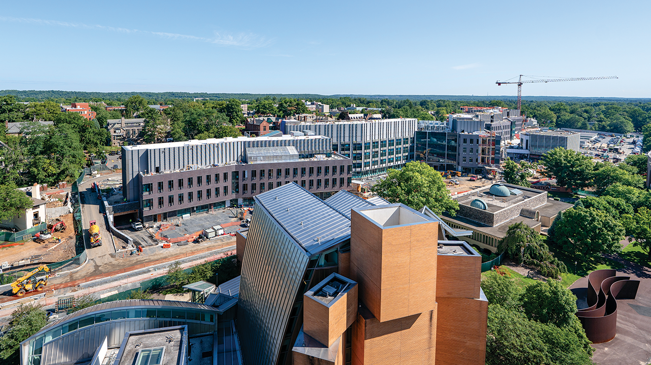 Buildings under construction, with Lewis Science Library in foreground