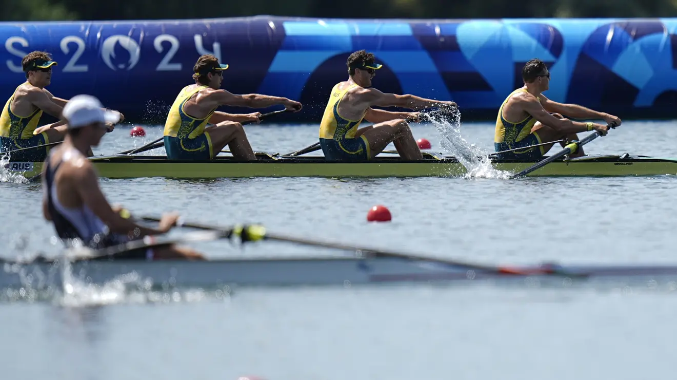 Tim Masters ’15, left, and Australian teammates Jack Robertson, Fergus Hamilton, and Alex Hill compete in the men's four rowing heats during the Paris 2024 Olympic Summer Games at Vaires-sur-Marne Nautical Stadium.