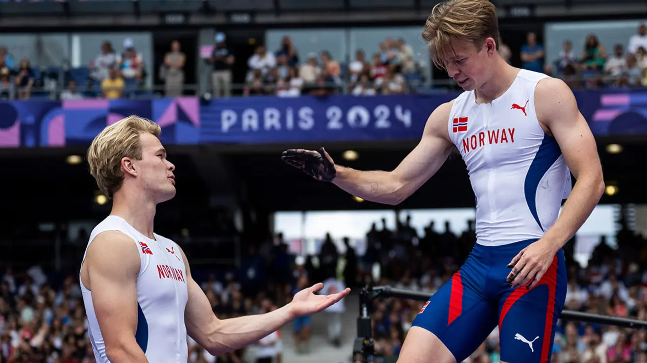 Paris-Slides-sondre-simen-AP24216381316431.jpg Sondre Guttormsen ’23, left, and Simen Guttormsen ’23 of Norway compete in the pole vault qualification.