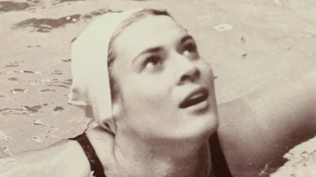 Cathy Corcione ’74 in pool in black and white photo