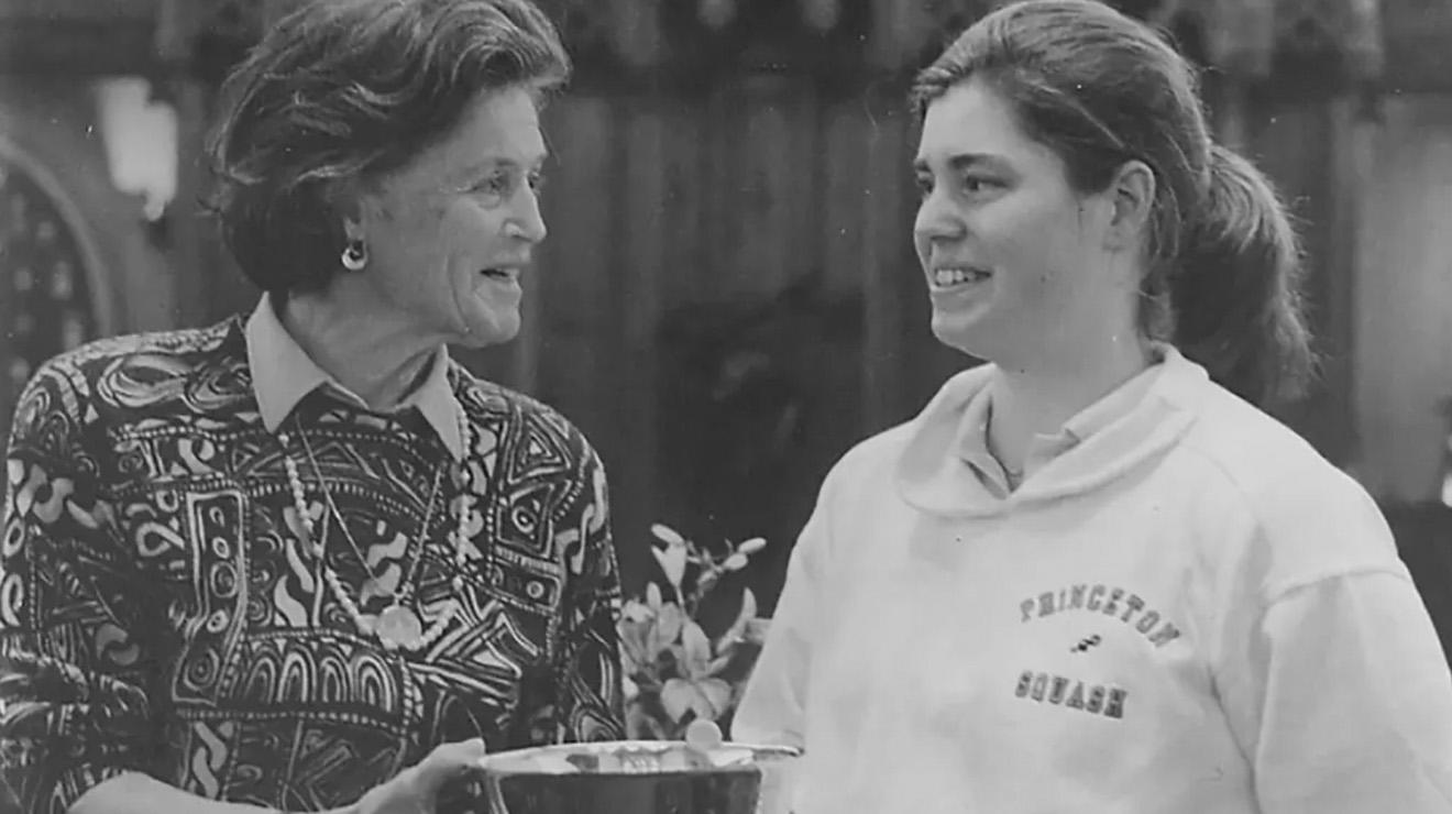 Demer Holleran ’89 receing an award in black and white photo