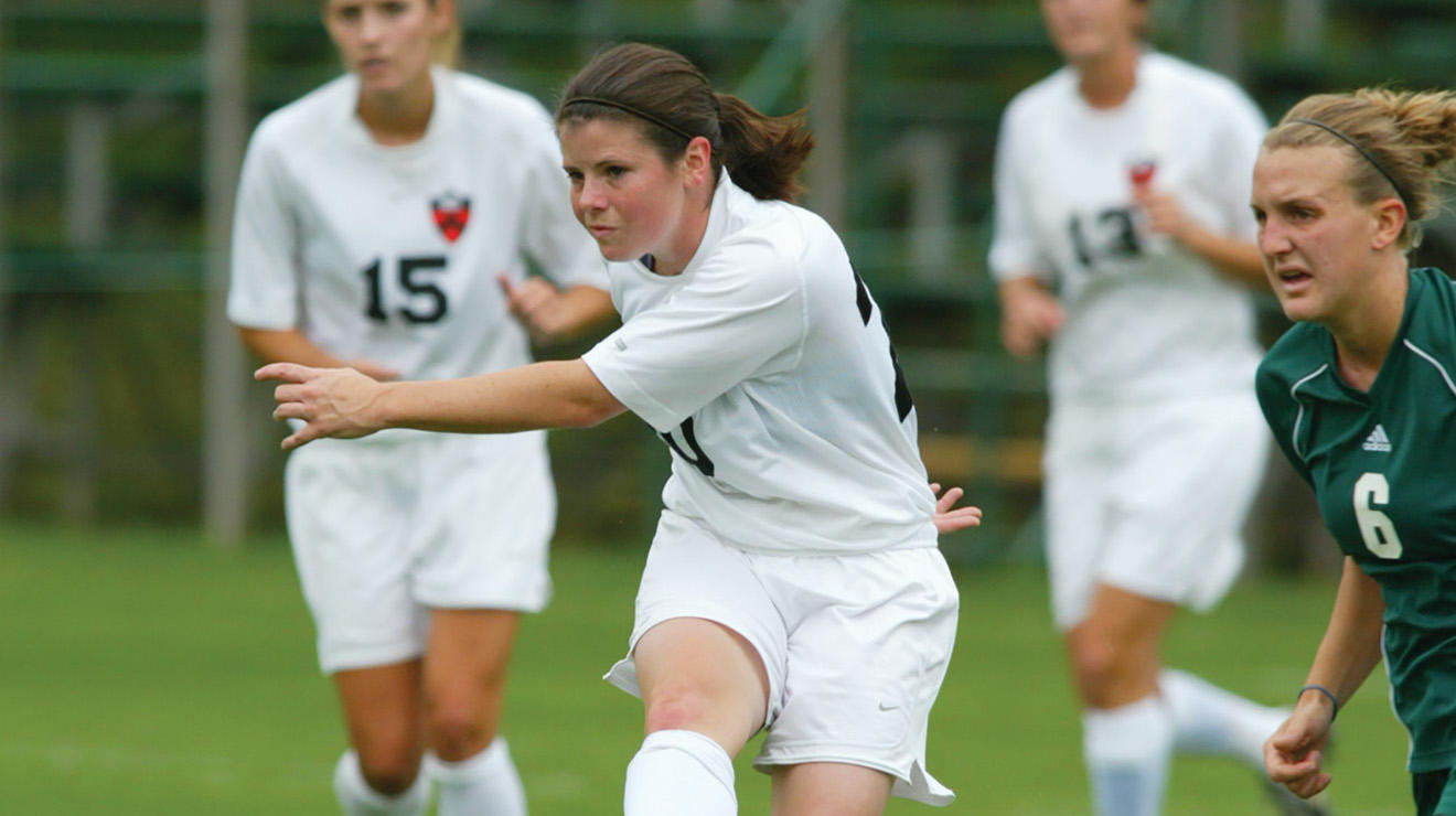 Diana Matheson ’08 strikes the ball during a game