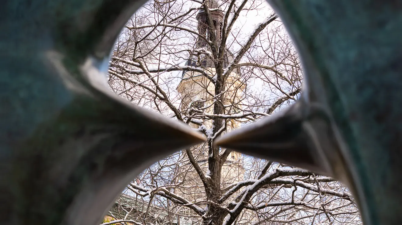 OTC_Feb Opener.jpg Henry Moore’s Oval With Points frames the Nassau Hall cupola after a mid-December dusting on campus.
